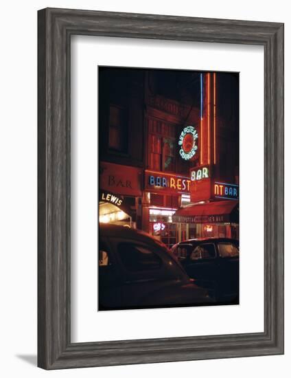 1945: a Night Image of Beef Steak Charlie's Restaurant on 50th and Broadway, New York, NY-Andreas Feininger-Framed Photographic Print