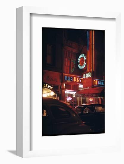 1945: a Night Image of Beef Steak Charlie's Restaurant on 50th and Broadway, New York, NY-Andreas Feininger-Framed Photographic Print