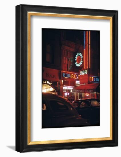 1945: a Night Image of Beef Steak Charlie's Restaurant on 50th and Broadway, New York, NY-Andreas Feininger-Framed Photographic Print