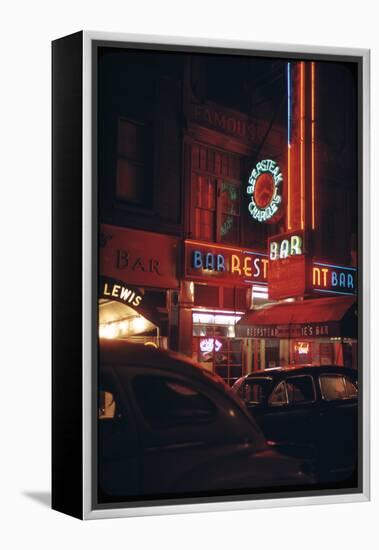 1945: a Night Image of Beef Steak Charlie's Restaurant on 50th and Broadway, New York, NY-Andreas Feininger-Framed Premier Image Canvas