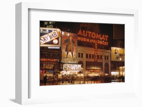 1945: Broadway and 42nd Street at Night in Front of Automat Horn and Hardart, New York, NY-Andreas Feininger-Framed Photographic Print