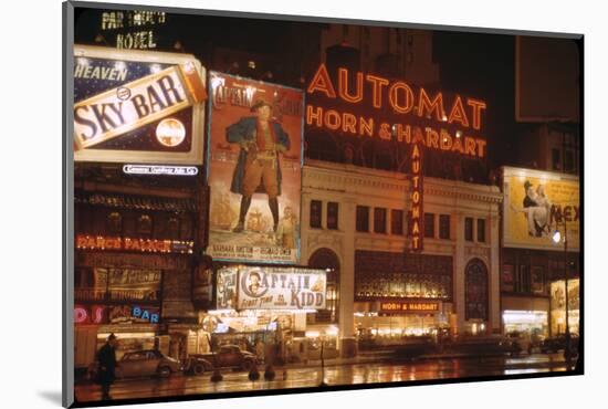 1945: Broadway and 42nd Street at Night in Front of Automat Horn and Hardart, New York, NY-Andreas Feininger-Mounted Photographic Print