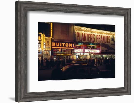 1945: Embassy Theater Showing Newsreel Format Films at Night, Times Square, New York, NY-Andreas Feininger-Framed Photographic Print