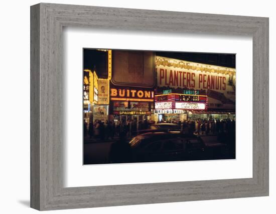 1945: Embassy Theater Showing Newsreel Format Films at Night, Times Square, New York, NY-Andreas Feininger-Framed Photographic Print