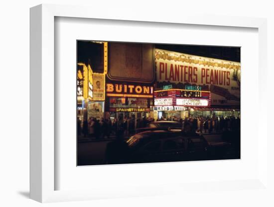 1945: Embassy Theater Showing Newsreel Format Films at Night, Times Square, New York, NY-Andreas Feininger-Framed Photographic Print