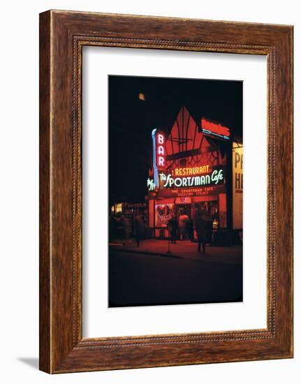 1945: Neon Lights Outside the Sportsman Cafe on 236 West 50th Street at Night, New York, NY-Andreas Feininger-Framed Photographic Print