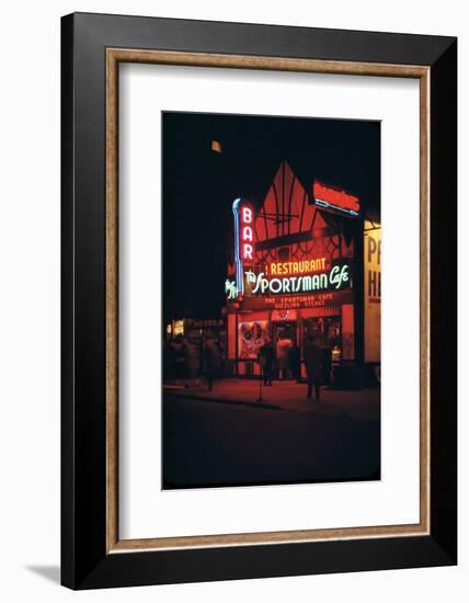 1945: Neon Lights Outside the Sportsman Cafe on 236 West 50th Street at Night, New York, NY-Andreas Feininger-Framed Photographic Print