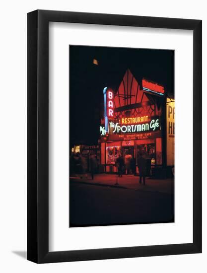 1945: Neon Lights Outside the Sportsman Cafe on 236 West 50th Street at Night, New York, NY-Andreas Feininger-Framed Photographic Print