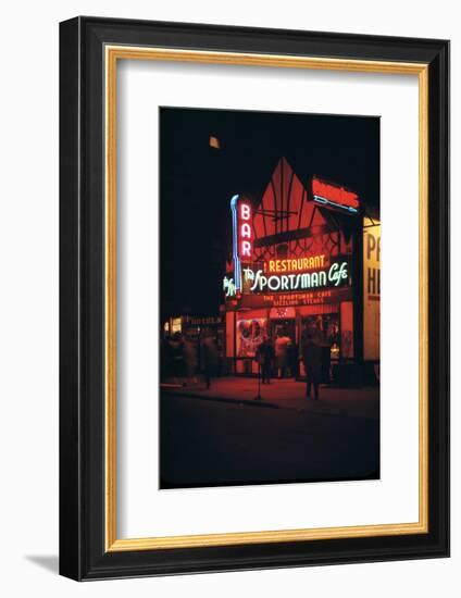1945: Neon Lights Outside the Sportsman Cafe on 236 West 50th Street at Night, New York, NY-Andreas Feininger-Framed Photographic Print