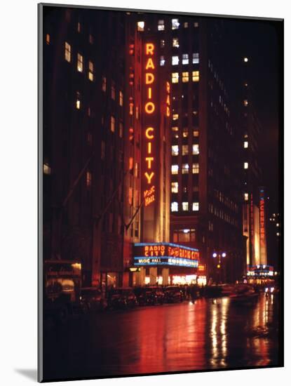 1945: Radio City Music Hall Lit Up at Night, New York, Ny-Andreas Feininger-Mounted Photographic Print