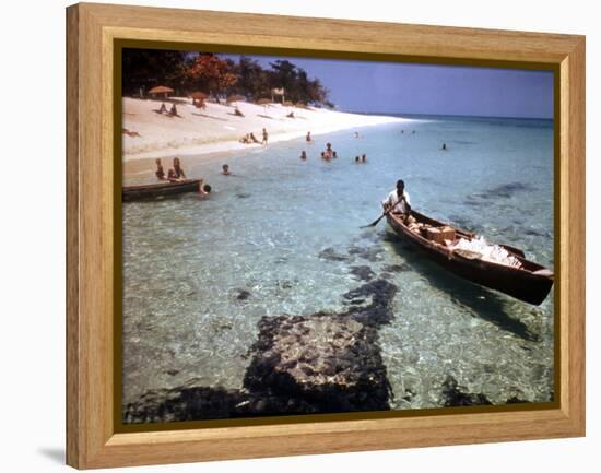 1946: Sam Cunningham Sells Sea Shells to Tourist Along the Seashore in Montego Bay, Jamaica-Eliot Elisofon-Framed Premier Image Canvas