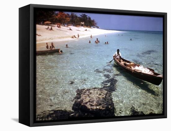 1946: Sam Cunningham Sells Sea Shells to Tourist Along the Seashore in Montego Bay, Jamaica-Eliot Elisofon-Framed Premier Image Canvas