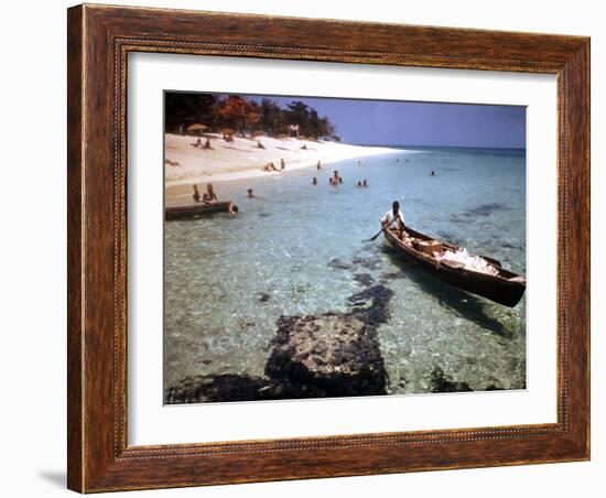 1946: Sam Cunningham Sells Sea Shells to Tourist Along the Seashore in Montego Bay, Jamaica-Eliot Elisofon-Framed Photographic Print