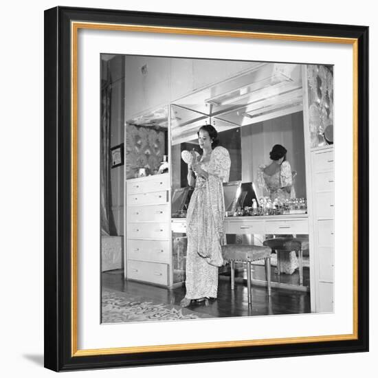 1949: Consuelo Madrigal Putting Make Up on for a Party-Jack Birns-Framed Photographic Print