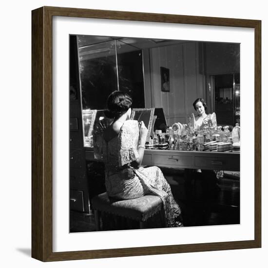 1949: Consuelo Madrigal Putting Make Up on for a Party-Jack Birns-Framed Photographic Print