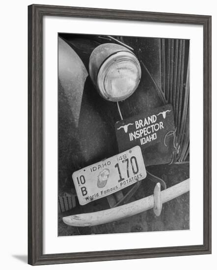 1949 Idaho License Plate Featuring a Buttered Baked Potato on a Cattle Brand Inspector's Car-null-Framed Photographic Print