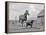 1950s-1960s Black Dog Leading Horse by Holding Rope Halter in His Mouth-null-Framed Premier Image Canvas