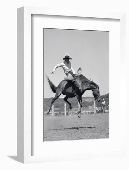 1950s COWBOY RIDING A HORSE BAREBACK ON A WESTERN RANCH USA-Pound-Framed Photographic Print