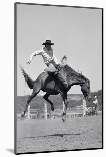 1950s COWBOY RIDING A HORSE BAREBACK ON A WESTERN RANCH USA-Pound-Mounted Photographic Print