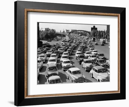 1950s Heavy Traffic Coming Off of the Ben Franklin Bridge Driving from Camden NJ-null-Framed Photographic Print