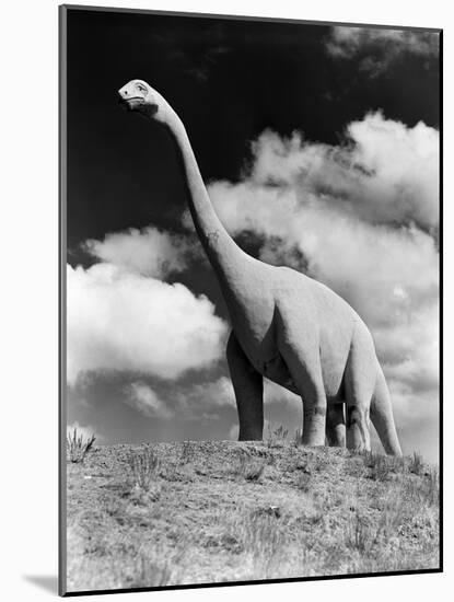 1950s Life-Size Statue of Extinct Long Neck Gigantic Brontosaurus Dinosaur Park Established 1936-null-Mounted Photographic Print