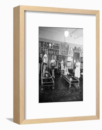 1951: Roberta Peters Working Out with Joseph Pilates and Others in a Studio, New York, NY-Michael Rougier-Framed Photographic Print