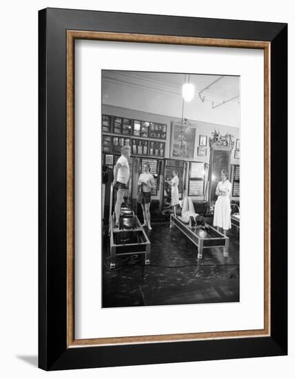 1951: Roberta Peters Working Out with Joseph Pilates and Others in a Studio, New York, NY-Michael Rougier-Framed Photographic Print