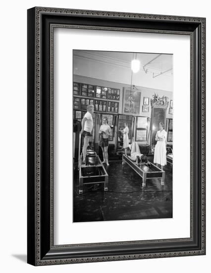 1951: Roberta Peters Working Out with Joseph Pilates and Others in a Studio, New York, NY-Michael Rougier-Framed Photographic Print