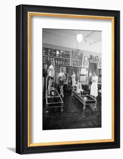 1951: Roberta Peters Working Out with Joseph Pilates and Others in a Studio, New York, NY-Michael Rougier-Framed Photographic Print