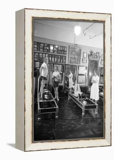 1951: Roberta Peters Working Out with Joseph Pilates and Others in a Studio, New York, NY-Michael Rougier-Framed Premier Image Canvas