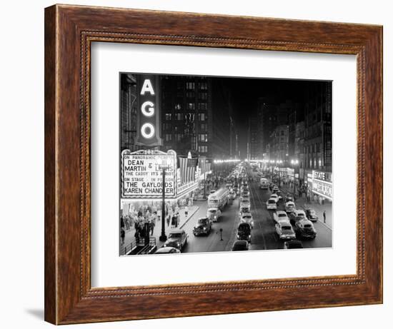 1953 Night Scene of Chicago, State Street with Traffic and Movie Marquee with Pedestrians-null-Framed Photographic Print