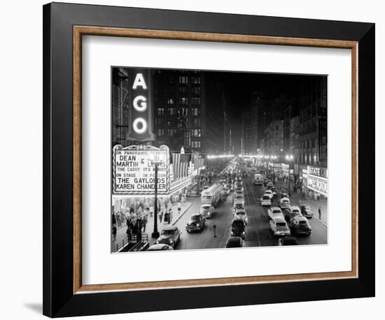 1953 Night Scene of Chicago, State Street with Traffic and Movie Marquee with Pedestrians-null-Framed Photographic Print