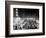 1953 Night Scene of Chicago, State Street with Traffic and Movie Marquee with Pedestrians-null-Framed Photographic Print