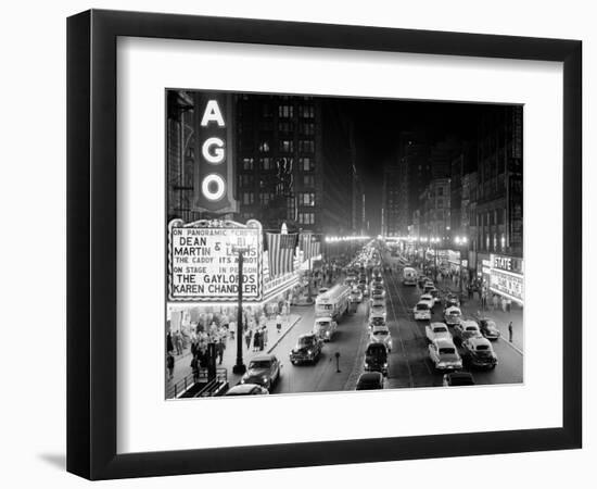 1953 Night Scene of Chicago, State Street with Traffic and Movie Marquee with Pedestrians-null-Framed Photographic Print