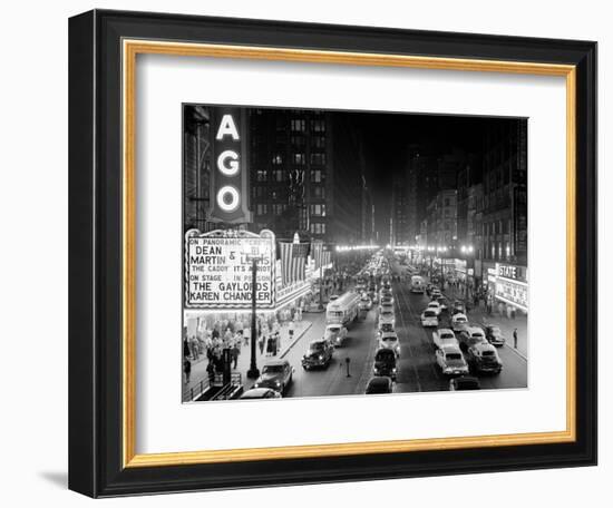 1953 Night Scene of Chicago, State Street with Traffic and Movie Marquee with Pedestrians-null-Framed Photographic Print