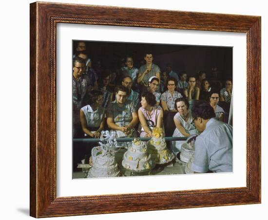 1955: a Man Demonstrates Cake Frosting Techniques at the Iowa State Fair, Des Moines, Iowa-John Dominis-Framed Photographic Print