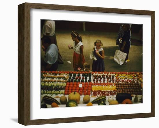 1955: Fairgoers as They Look at a Display of Produce at the Iowa State Fair, Des Moines, Iowa-John Dominis-Framed Photographic Print