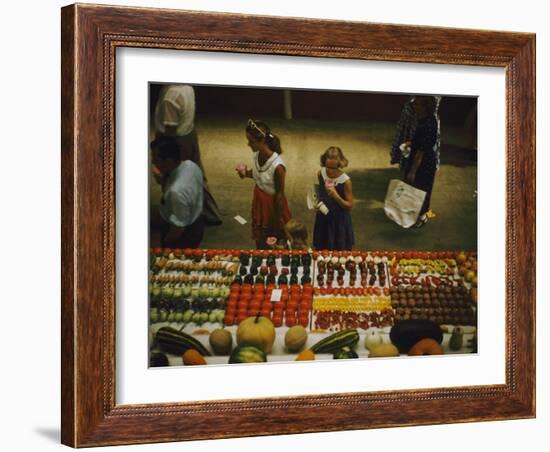 1955: Fairgoers as They Look at a Display of Produce at the Iowa State Fair, Des Moines, Iowa-John Dominis-Framed Photographic Print