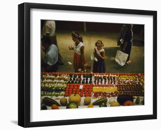 1955: Fairgoers as They Look at a Display of Produce at the Iowa State Fair, Des Moines, Iowa-John Dominis-Framed Photographic Print