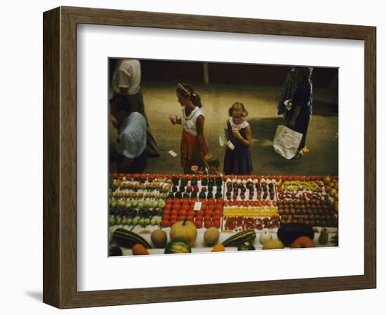 1955: Fairgoers as They Look at a Display of Produce at the Iowa State Fair, Des Moines, Iowa-John Dominis-Framed Photographic Print
