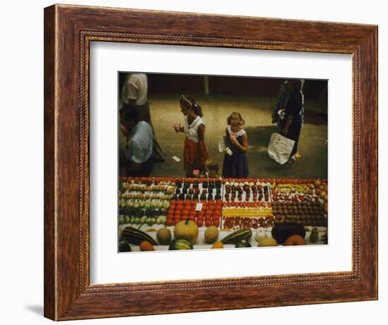 1955: Fairgoers as They Look at a Display of Produce at the Iowa State Fair, Des Moines, Iowa-John Dominis-Framed Photographic Print