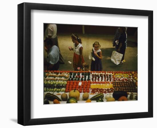 1955: Fairgoers as They Look at a Display of Produce at the Iowa State Fair, Des Moines, Iowa-John Dominis-Framed Photographic Print