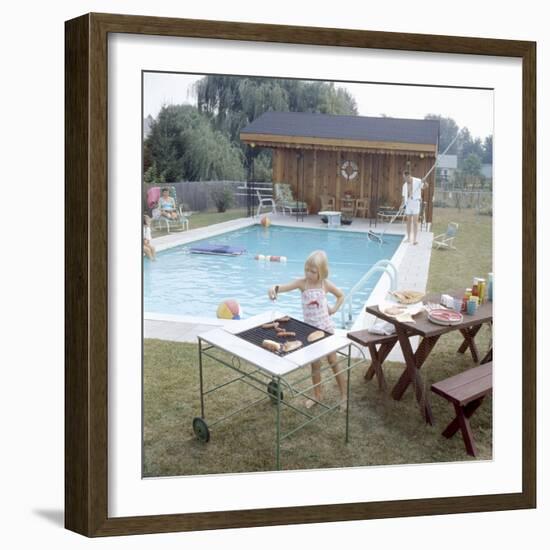 1959: Family Cookout and Enjoying the Backyard Swimming Pool, Trenton, New Jersey-Frank Scherschel-Framed Photographic Print