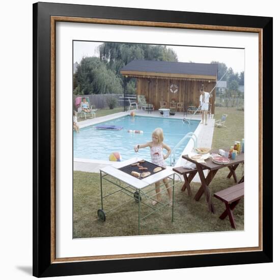 1959: Family Cookout and Enjoying the Backyard Swimming Pool, Trenton, New Jersey-Frank Scherschel-Framed Photographic Print