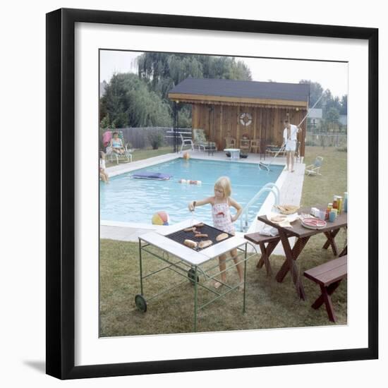 1959: Family Cookout and Enjoying the Backyard Swimming Pool, Trenton, New Jersey-Frank Scherschel-Framed Photographic Print