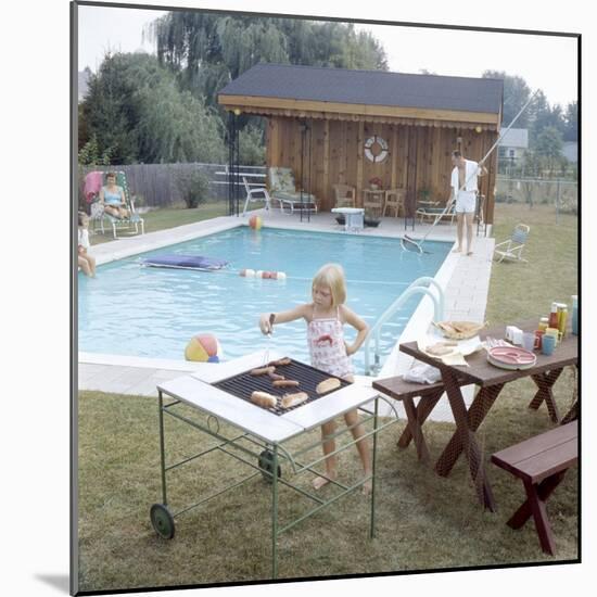 1959: Family Cookout and Enjoying the Backyard Swimming Pool, Trenton, New Jersey-Frank Scherschel-Mounted Photographic Print