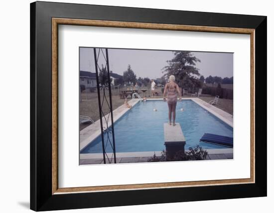 1959: Susan in Diving Stance During a Family Cookout, Trenton, New Jersey-Frank Scherschel-Framed Photographic Print