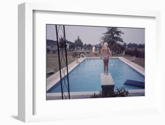 1959: Susan in Diving Stance During a Family Cookout, Trenton, New Jersey-Frank Scherschel-Framed Photographic Print