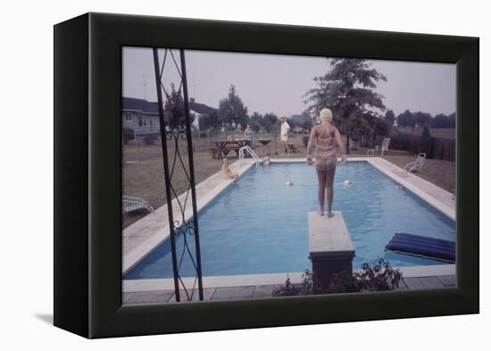 1959: Susan in Diving Stance During a Family Cookout, Trenton, New Jersey-Frank Scherschel-Framed Premier Image Canvas