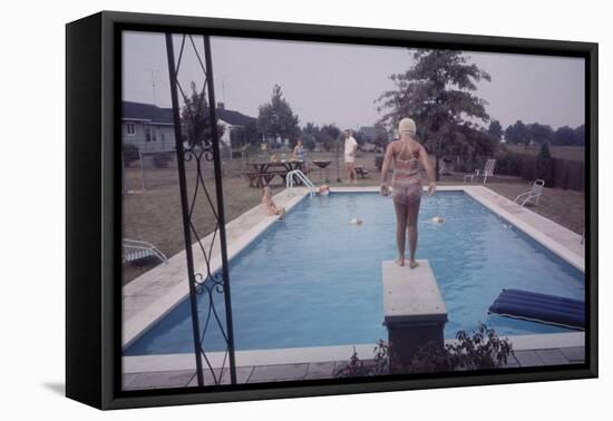 1959: Susan in Diving Stance During a Family Cookout, Trenton, New Jersey-Frank Scherschel-Framed Premier Image Canvas